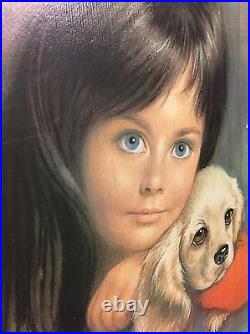 Framed Vintage, retro, 1960's portrait of a girl and a dog print. Signed