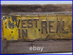 Vintage INVEST IN REAL ESTATE Embossed Painted Metal Advertising Sign Antique