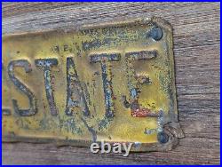 Vintage INVEST IN REAL ESTATE Embossed Painted Metal Advertising Sign Antique