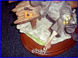 Vintage porcelan hand painted statue man signed dear sculpture artistiche Italy