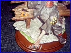 Vintage porcelan hand painted statue man signed dear sculpture artistiche Italy